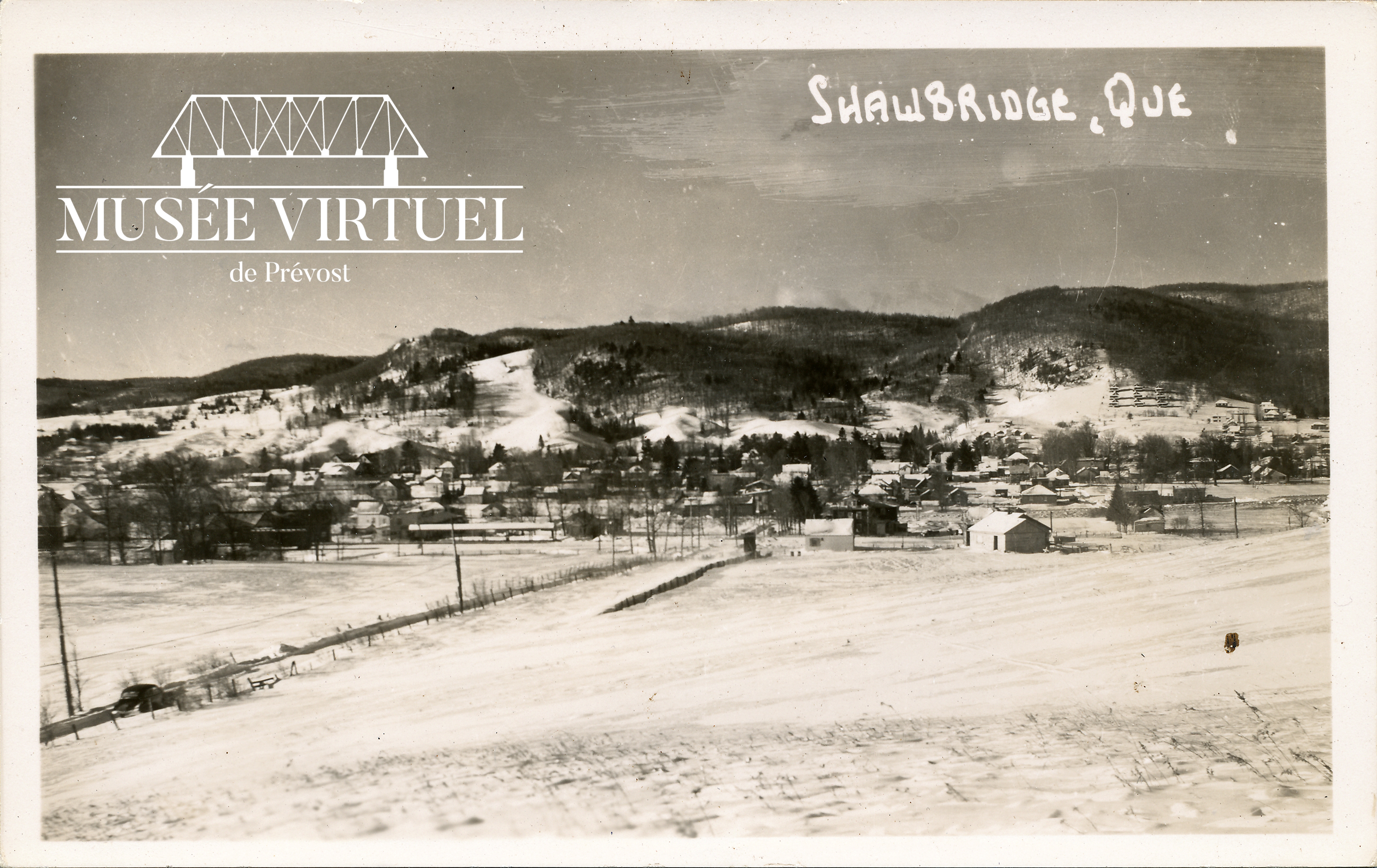 2. Vue générale sur la rue de la Station et le Vieux-Shawbridge au premier plan, ainsi que sur le Vieux-Prévost au loin - Don de Guy Thibault